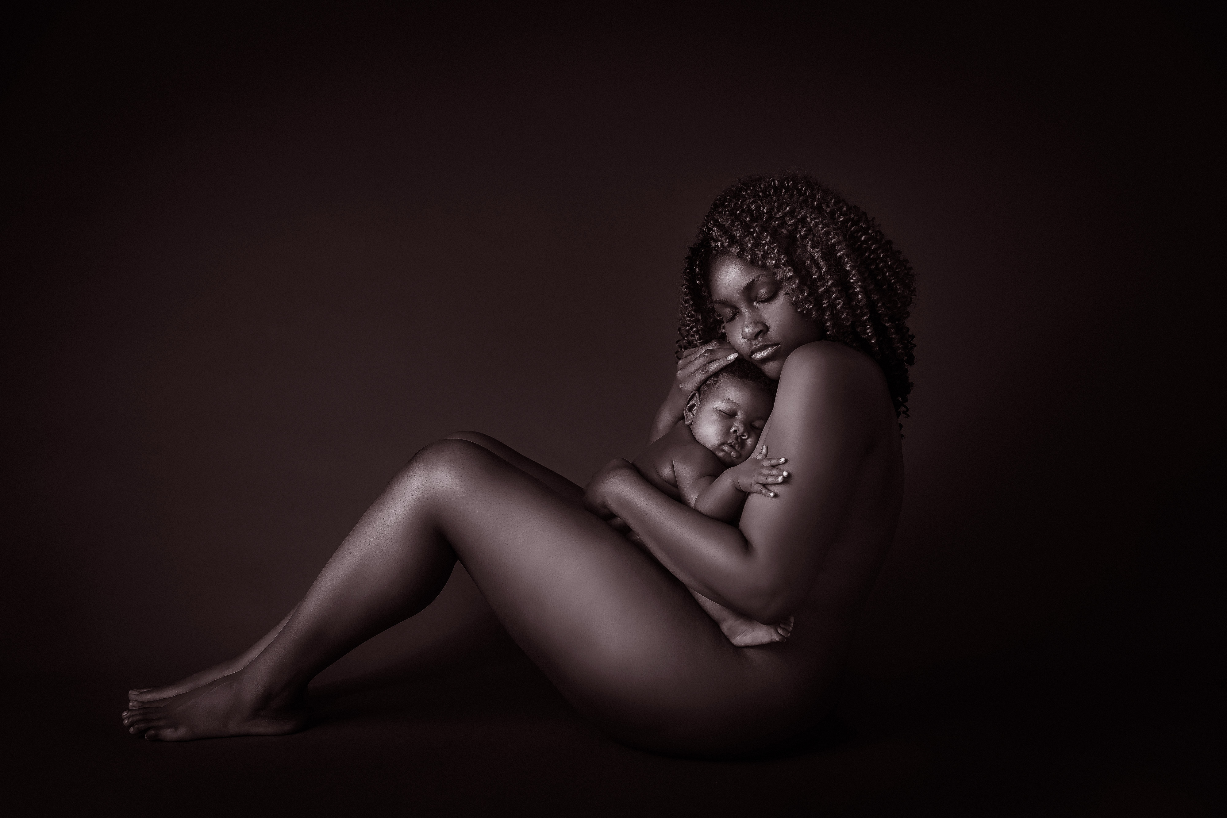mother baby nude studio portrait