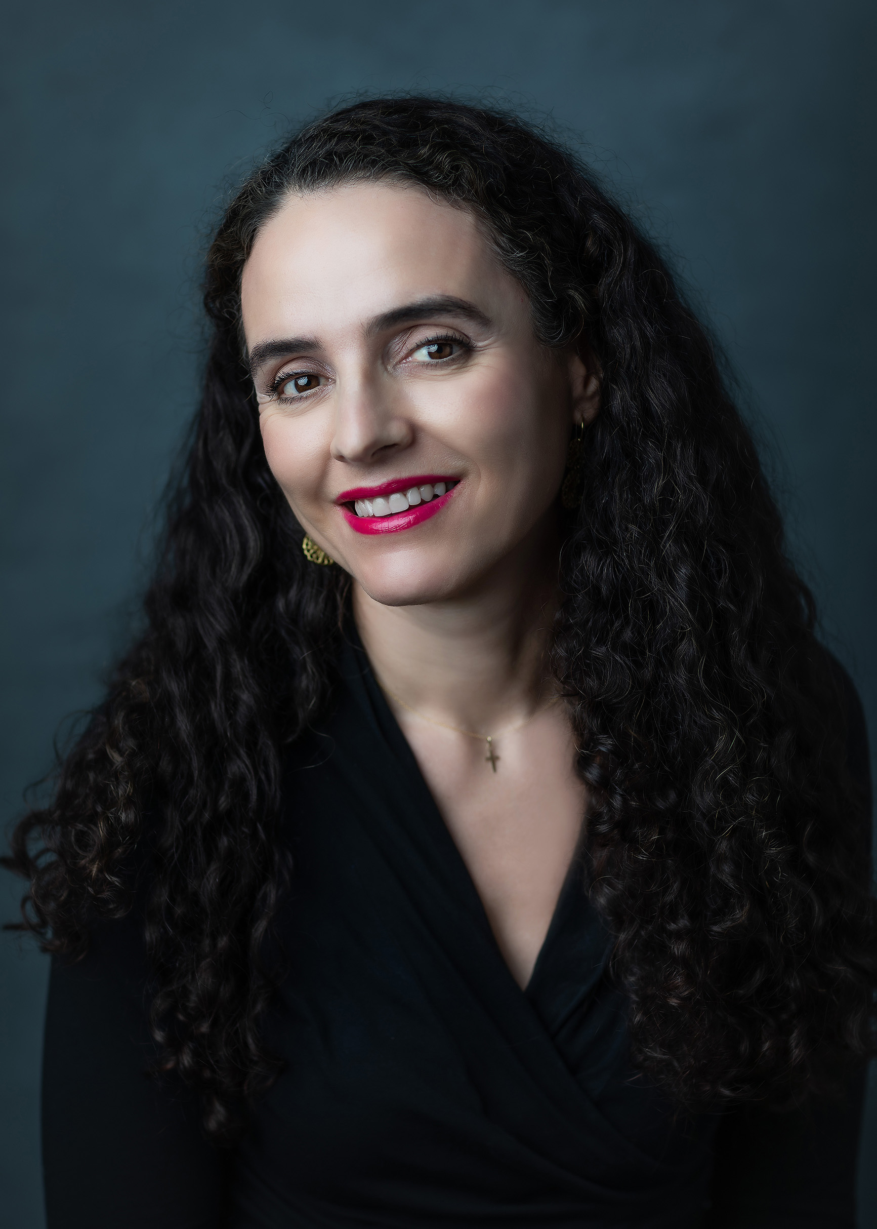 Newborn Photographer, Betty sits for a portrait, black hair, magenta lipstick