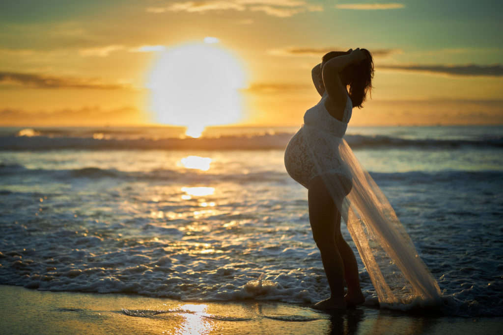 maternity photography at sunset on the beach