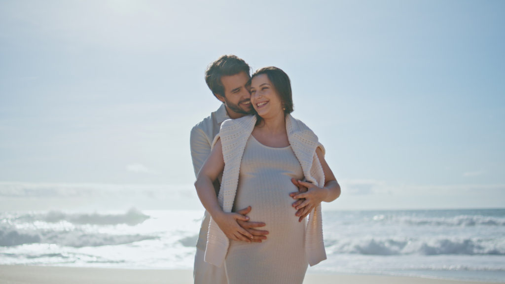 maternity photoshoot on the beach